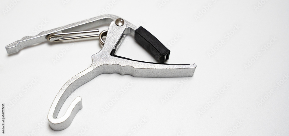 silver and black Guitar clip isolated in white background silver and black Guitar clip isolated in white background