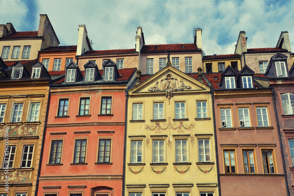 Traditional and colorful building architecture in the Old Town Market Square (Rynek Starego Miasta), Warsaw, Poland.
