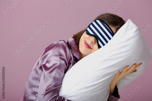 Sleepy woman with mask and ...