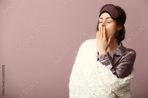 Sleepy woman with mask and ...