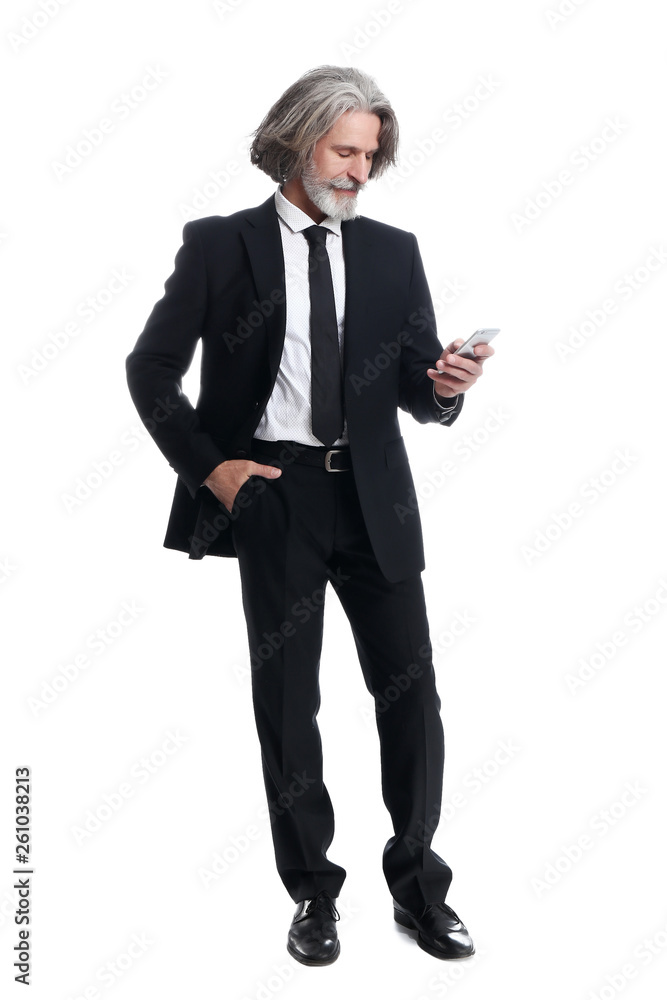 Handsome mature businessman with phone on white background Handsome mature businessman with phone on white background