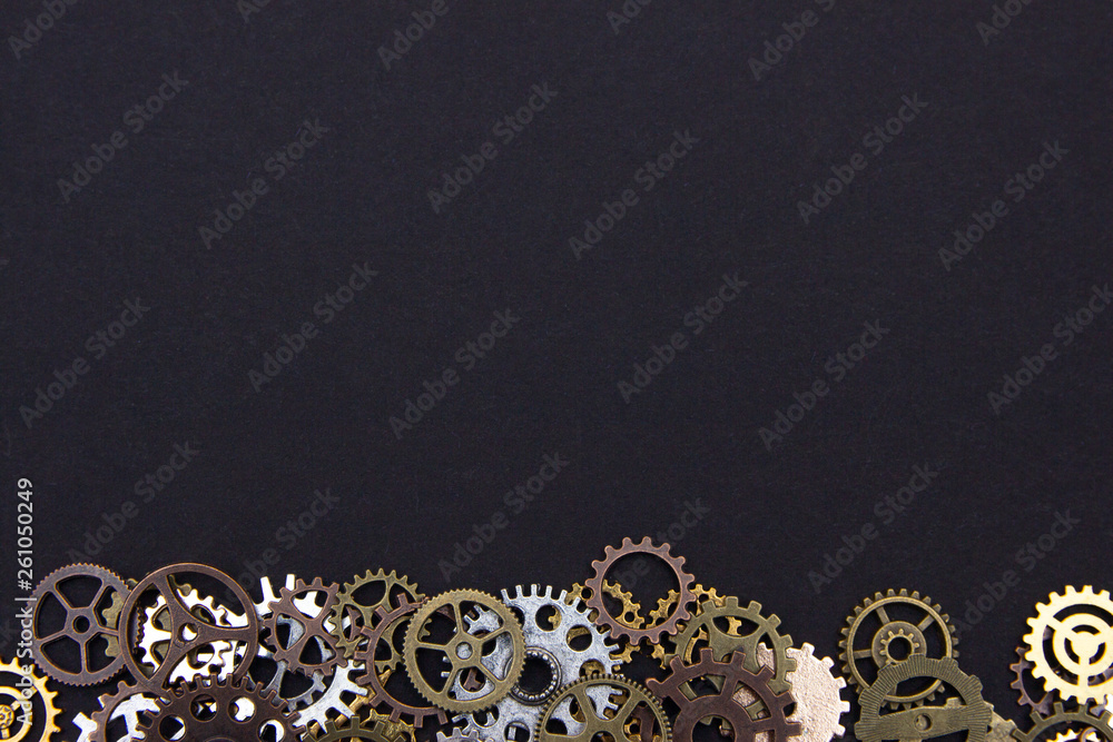 Steel gear gears on a black background. copy space. Steel gear gears on a black background. copy space.