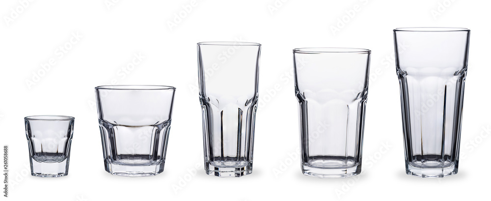 Set of five empty faceted glasses isolated on white background. 100 sharpness. Set of five empty faceted glasses isolated on white background. 100 sharpness.