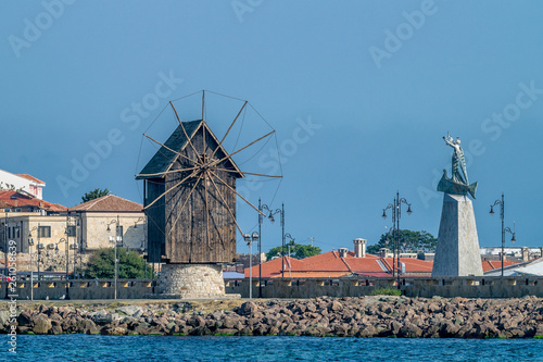 The wooden windmill on the isthmus Nessebar ancient city, one of the major seaside resorts on the Bulgarian Black Sea Coast. Nesebar or Nesebr is a UNESCO World Heritage Site. The windmill in Nessebar