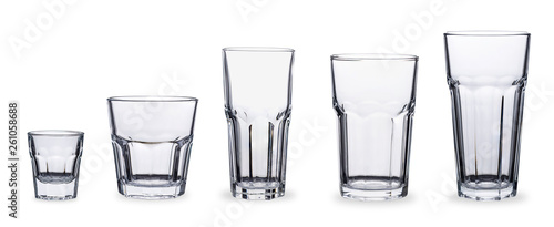 Set of five empty faceted glasses isolated on white background. 100 sharpness.