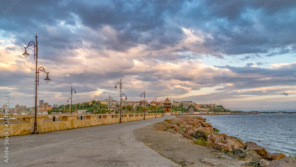 A street leading to Nessebar ancient city at sunrise, one of the major seaside resorts on the Bulgarian Black Sea Coast. Nesebar or Nesebr is a UNESCO World Heritage Site. Isthmus leading to Nessebar