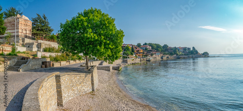 Panorama of Nessebar ancient city on the Bulgarian Black Sea Coast. Nesebar or Nesebr is a UNESCO World Heritage Site. Panoramic view of Nessebar city on a sunny day with blue sky, Bulgaria photo