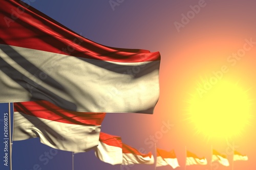 nice any holiday flag 3d illustration. - many Monaco flags on sunset placed diagonal with selective focused and place for text © Dancing Man