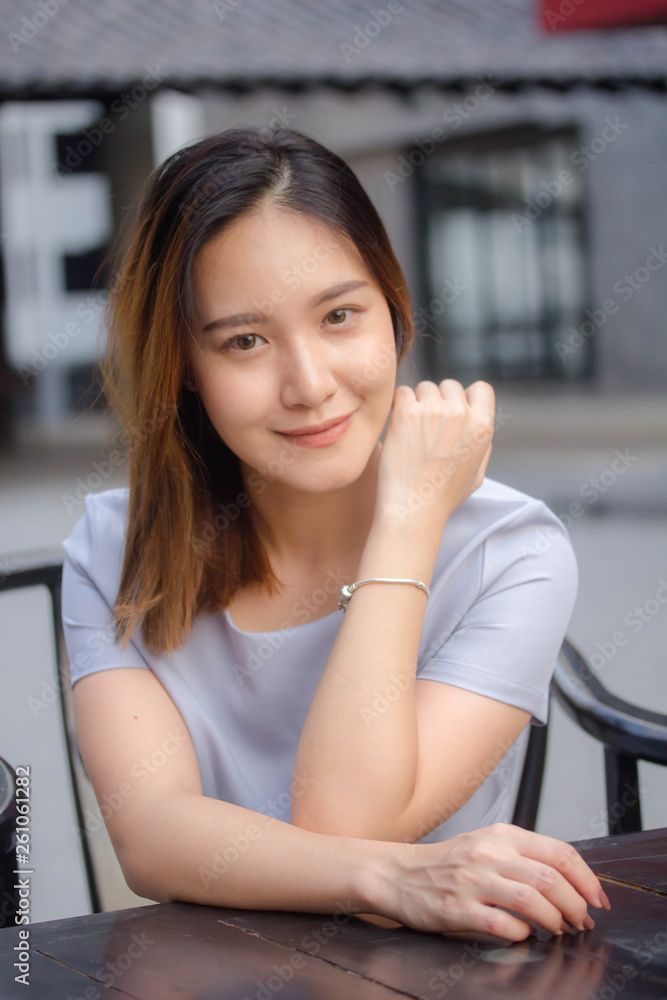 portrait of thai china adult office girl relax and smile