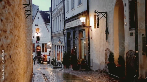 A cosy atmosphere on a street of medieval Old Town of Tallinn.