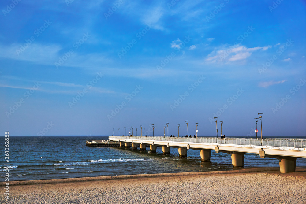 A concrete pier on the shore of the Baltic Sea in the city of Kolobrzeg.