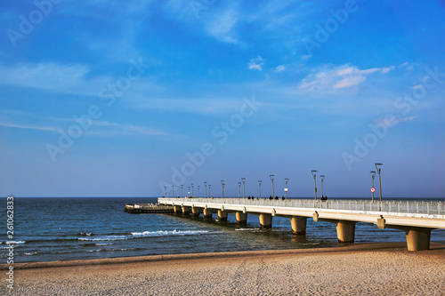 A concrete pier on the shore of the Baltic Sea in the city of Kolobrzeg.