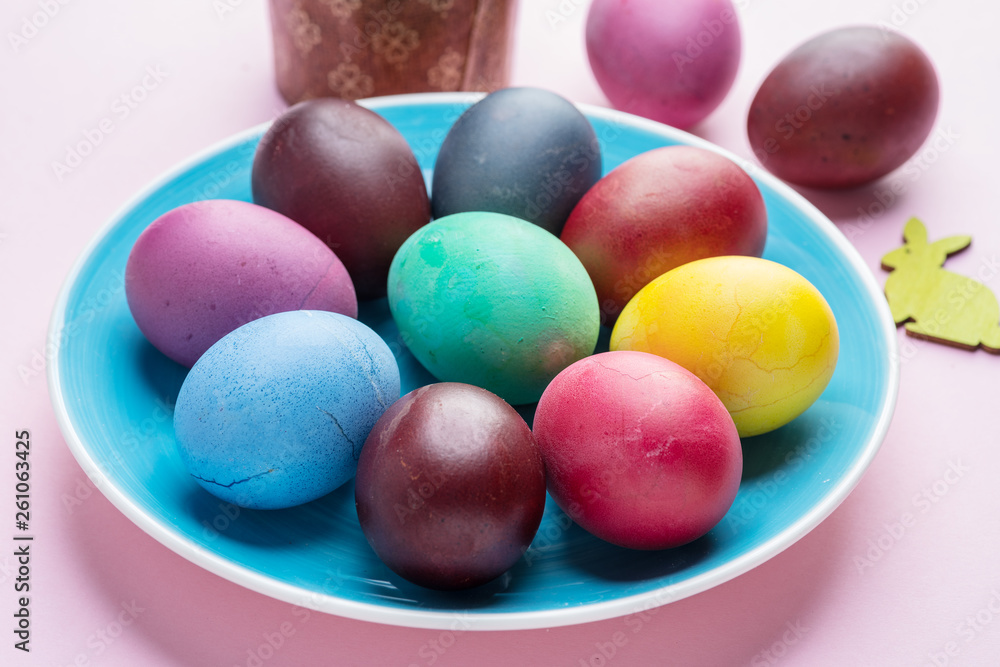 Colorful Easter eggs as an attribute of Easter celebration. Pink background. Colorful Easter eggs as an attribute of Easter celebration. Pink background.