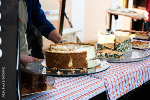 American spring market. Home bakery selling cheesecakes and pies. Holidays festival. Delicious cakes. Lifestyle.