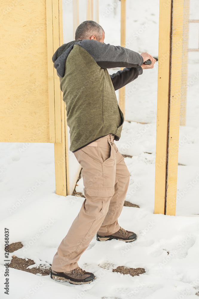 Indoor combat gun shooting training inside house on shooting range Indoor combat gun shooting training inside house on shooting range