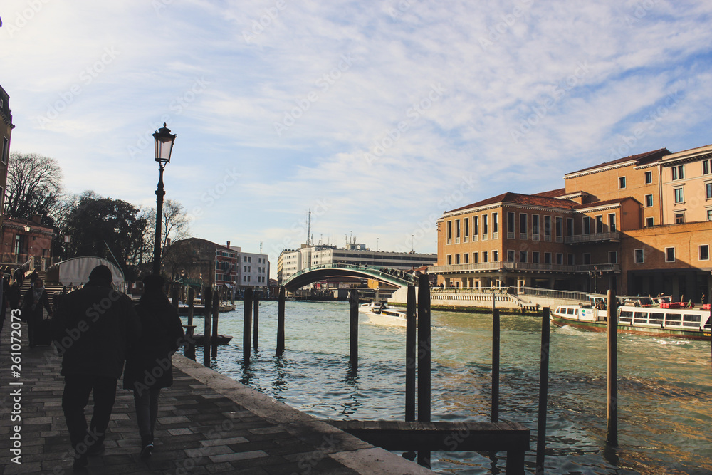 Grand Canal in Venice on a sunny day, Italy. Venice in the sunlight. Scenic panoramic view of Venice in winter.