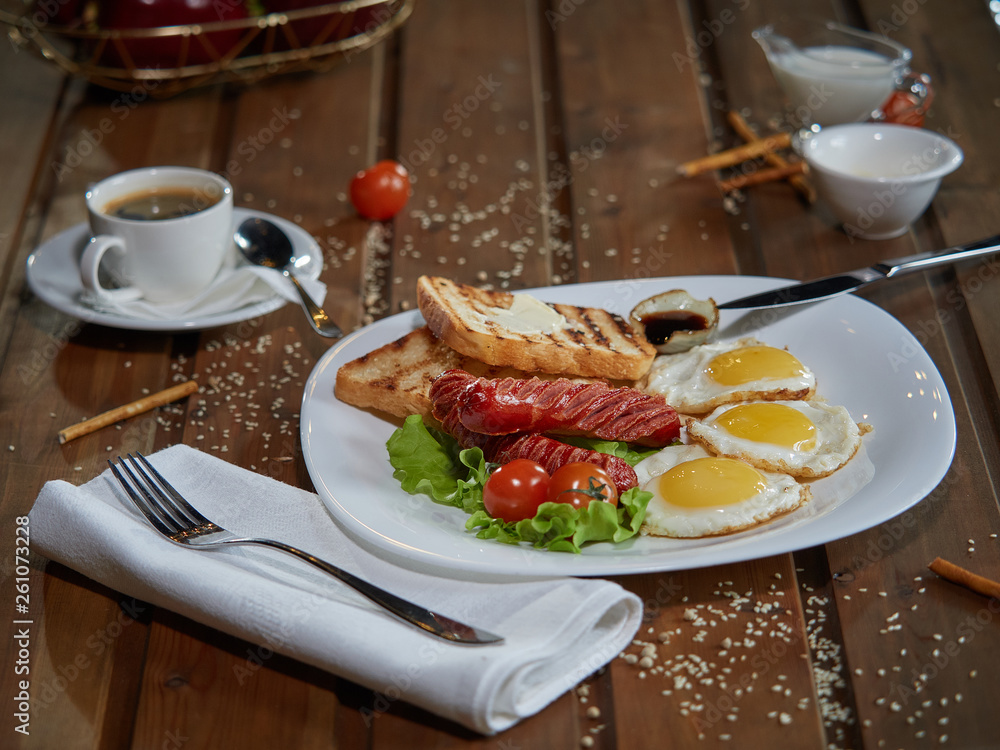 Fried eggs with sausage. Fried eggs with sausage.