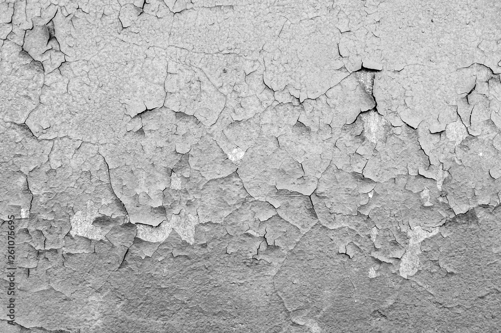 Old cracked paint on the concrete wall. Peeling paint on wall texture. Pattern of rustic blue grunge material Old cracked paint on the concrete wall. Peeling paint on wall texture. Pattern of rustic blue grunge material