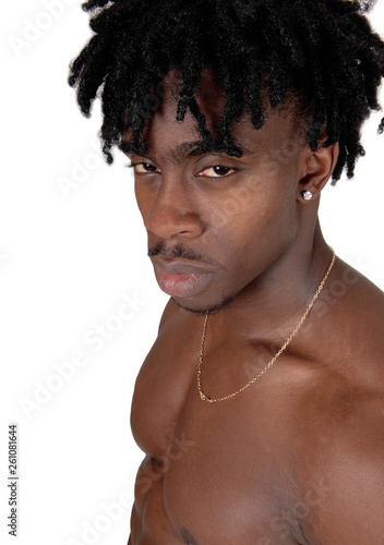 A close up portrait of a black man wihtout an shirt photo