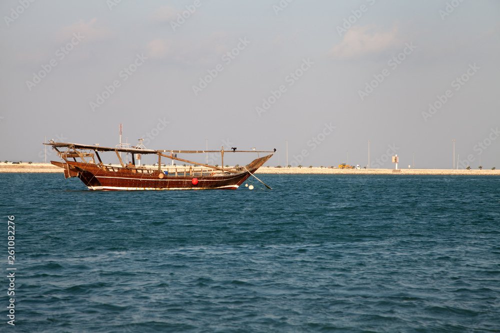 Traditonal fishing boat sailing in Bahrain sea Traditonal fishing boat sailing in Bahrain sea