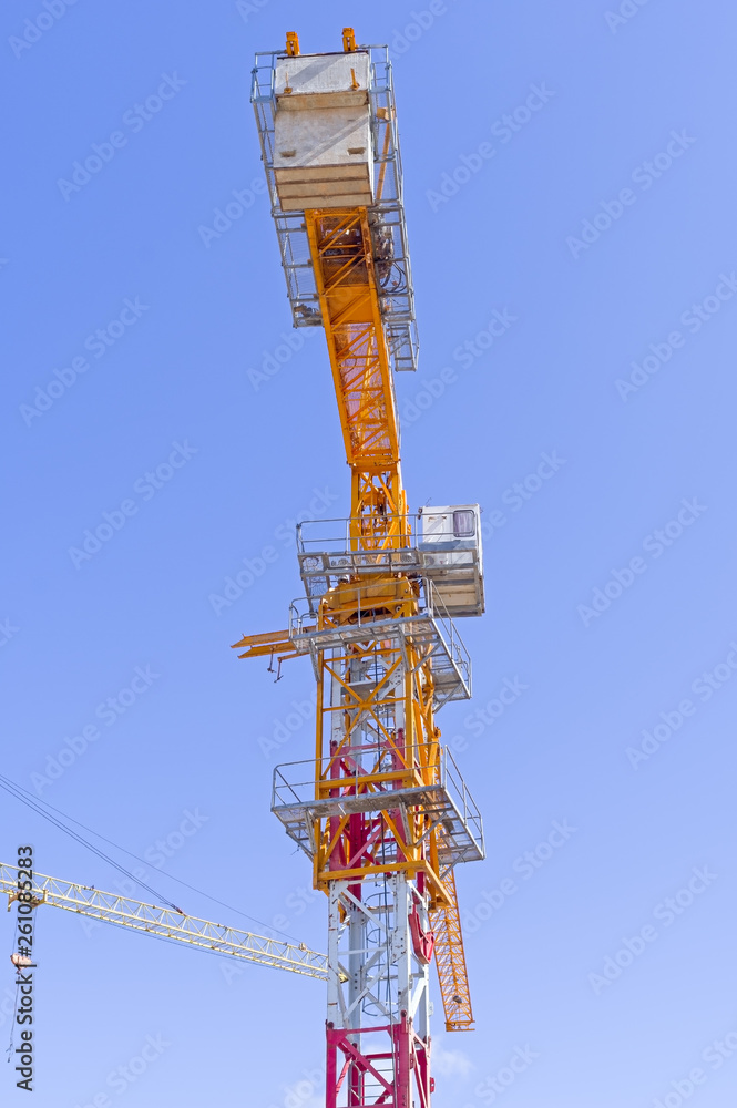 Lifting faucet on a background sky