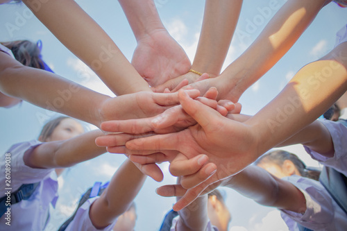 School children use hand-to-hand coordination to combine power in activities