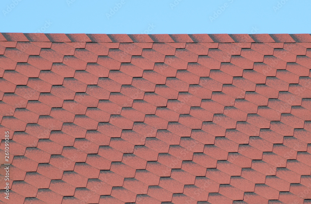 Decorative metal tile on a roof