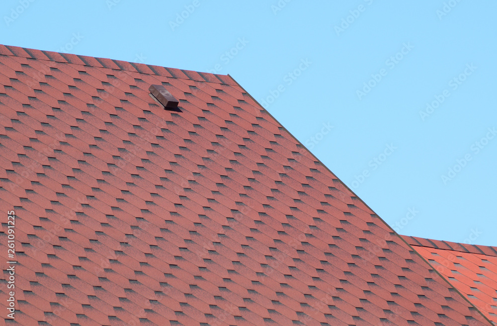 Decorative metal tile on a roof Decorative metal tile on a roof