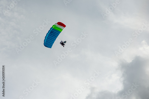 man with parachute in the sky
