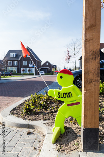 Slow traffic sign in subsurban neigbou photo