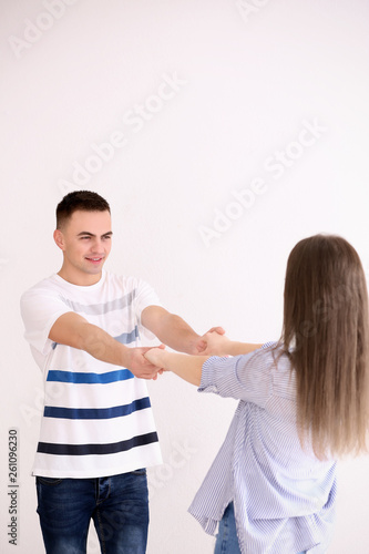 Young couple dancing togeth...