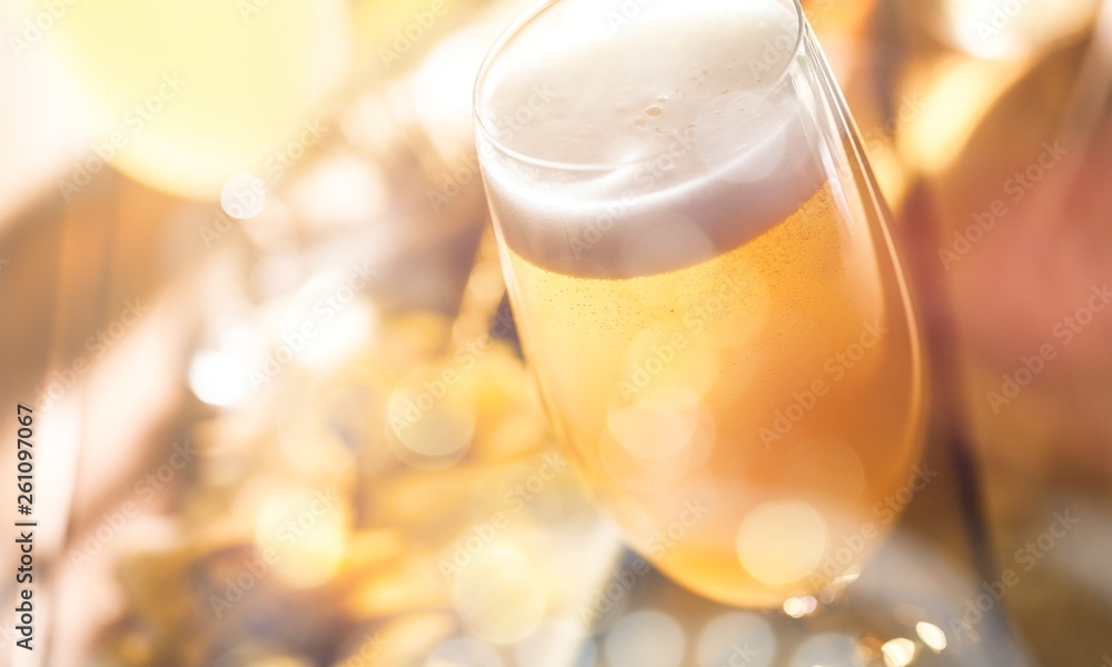 Glass of light beer on background Glass of light beer on background