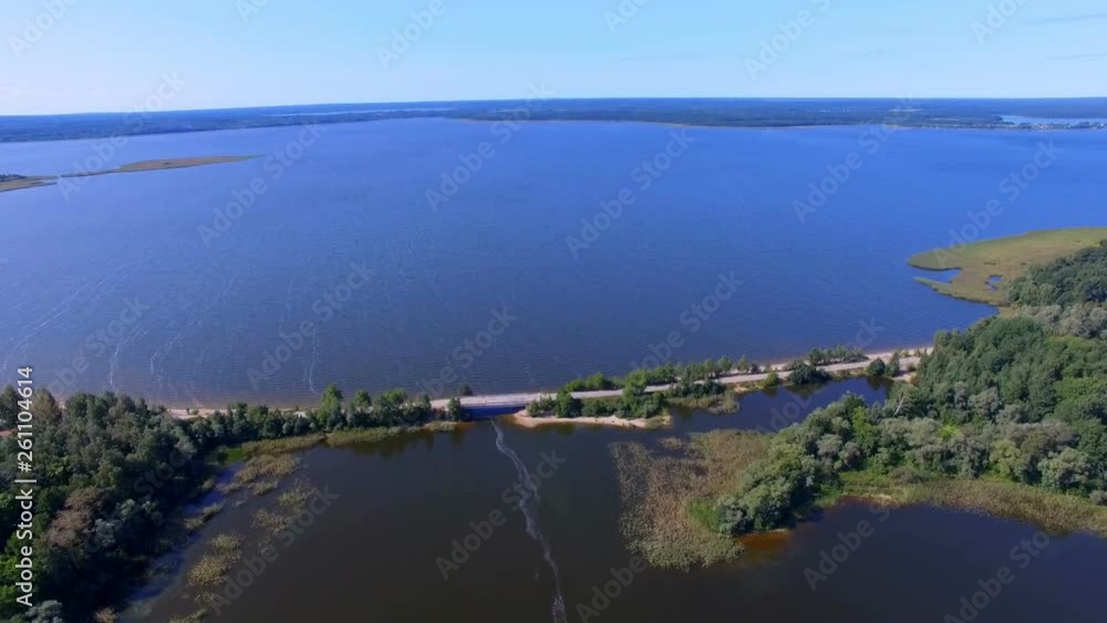 Aerial View Of A Small Bridge Over Lake Seliger And Klichen Island, Russia Aerial View Of A Small Bridge Over Lake Seliger And Klichen Island, Russia