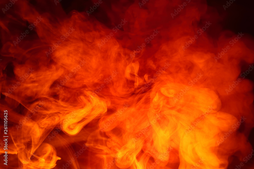 Imitation of bright flashes of orange-red flame. Background of abstract colored smoke. Imitation of bright flashes of orange-red flame. Background of abstract colored smoke.