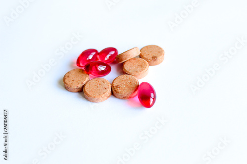 multicolored tablets, vitamins, medicines