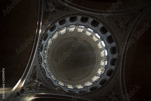 The dome of the old Catholic cathedral from the inside  the light makes its way through the stained glass windows.