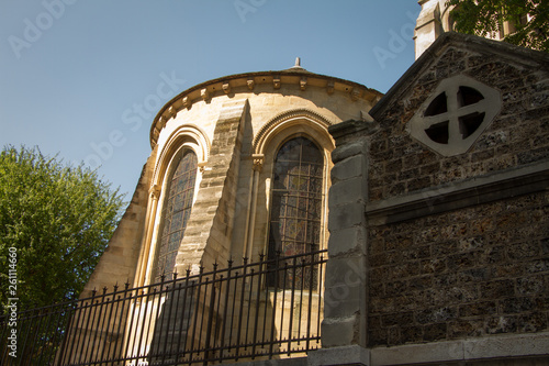 Details of an old Catholic cathedral, gargoyles, chimeras, arches, columns, sculpted facades. photo