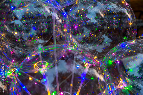 Multi-colored luminous led bulbs. Colorful background of glowing balls. Led balls for holidays. Festival of led decorations. The concept of energy-saving and cold lighting. Selective focus.