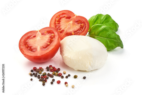 Traditional Italian Mozzarella cheese balls with basil and tomatoes, close-up, isolated on white background photo