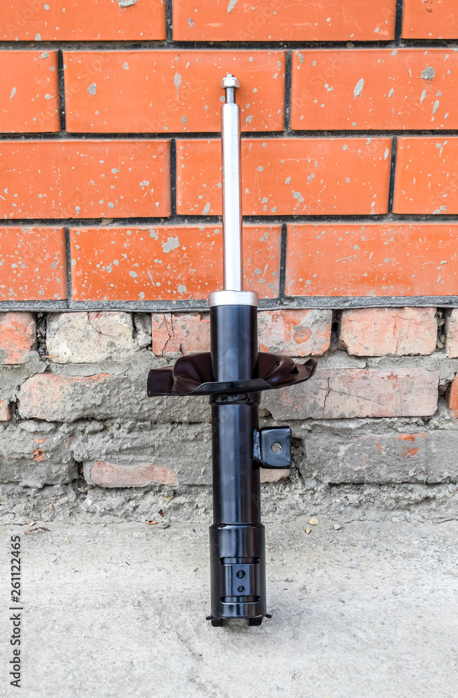 Car strut. Front shock absorber of a car Car strut. Front shock absorber of a car