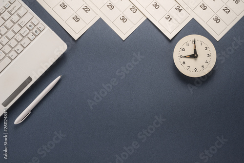 Calendar with dates, clock,  keyboard  and pen