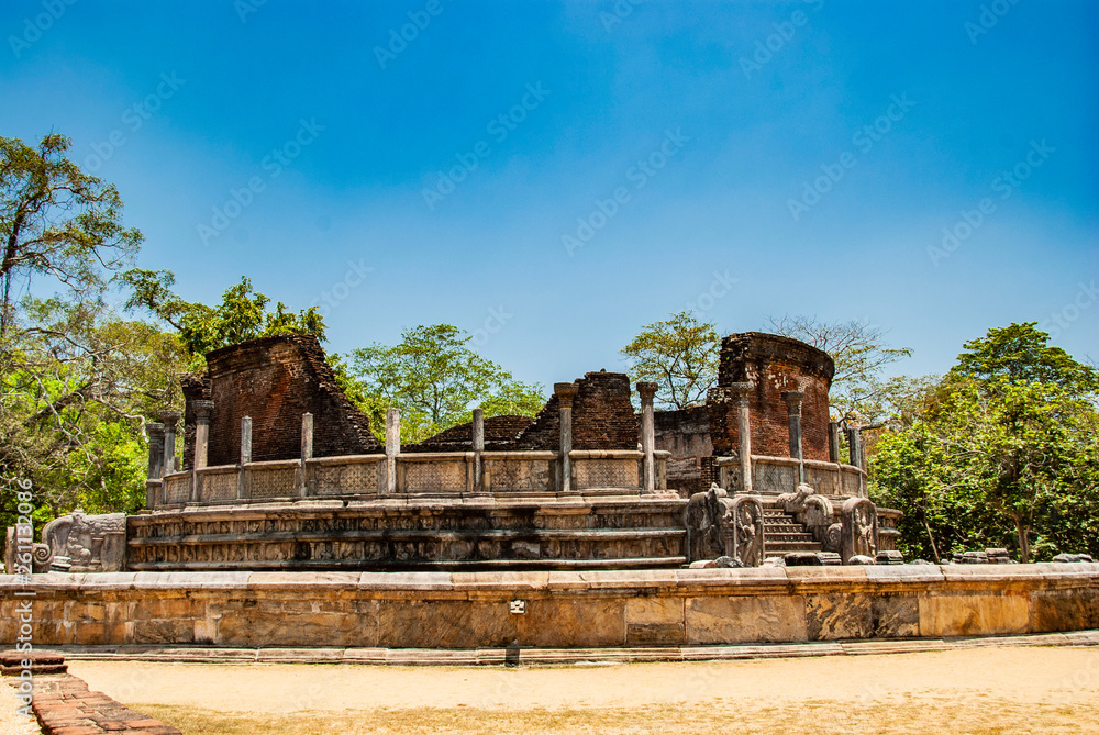 Naklejka premium The sacred quadrangle with buddha, ancient ruins in Polonnaruwa in Sri Lanka