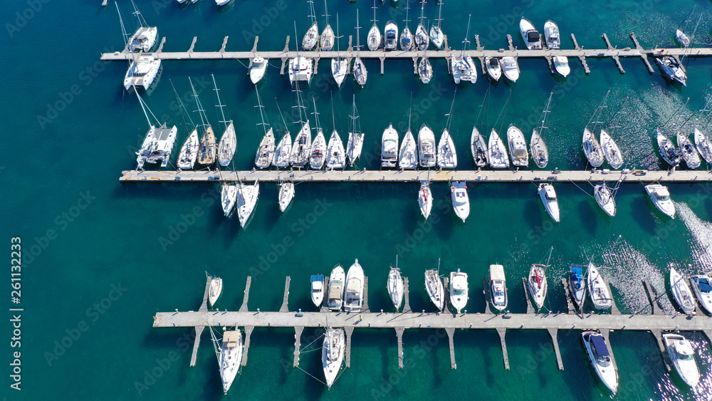 Aerial drone top view photo of mediterranean port with sail boats docked Aerial drone top view photo of mediterranean port with sail boats docked