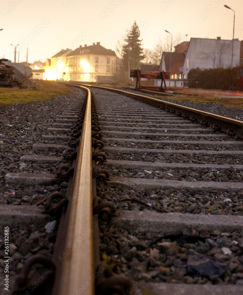 Fototapeta premium rail track with stones with a small focus at night