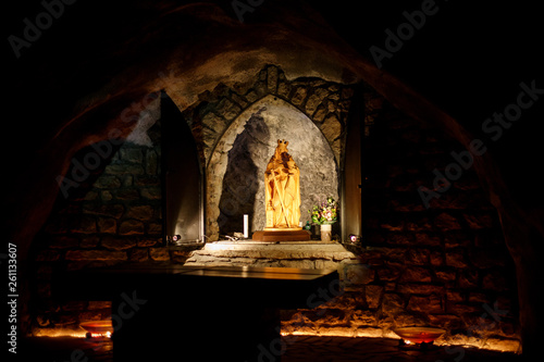a shrine of saint barbara in a dark cave