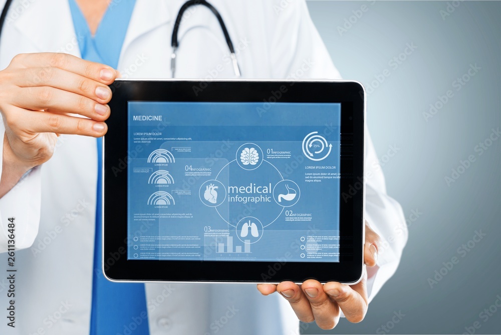 Close-up Doctor at hospital working with tablet pc Close-up Doctor at hospital working with tablet pc