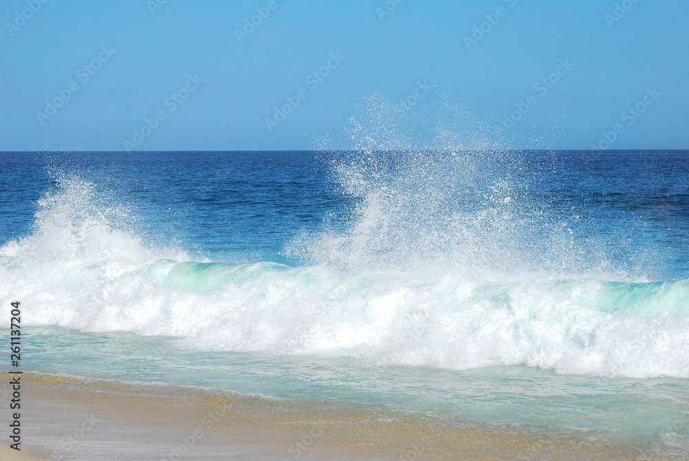 Wonderful splash waves on beach