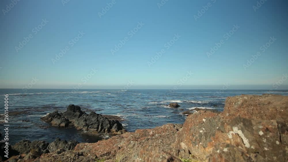 Jagged Rocks Lead Down to the Ocean Shore Jagged Rocks Lead Down to the Ocean Shore
