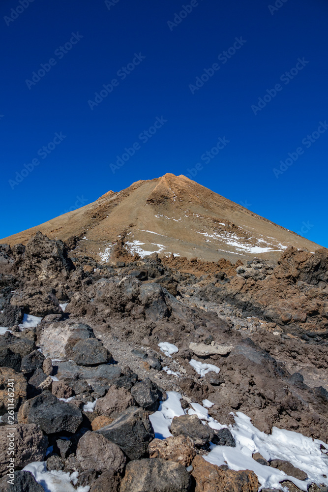 Teide iconic crater against deep blue sky in Tenerife