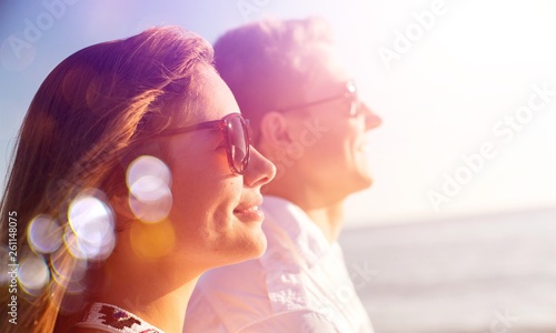 Young cute couple relaxing together in sunny day